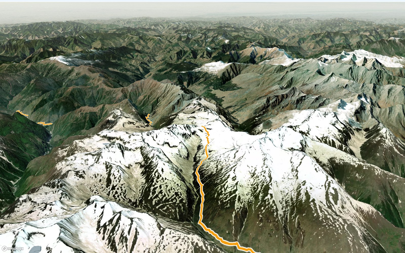 3D view of the Rupin Pass route climbing to the pass through snowfields, the trail in orange on satellite terrain